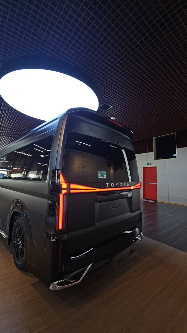 Black Toyota Alphard or Vellfire rear profile